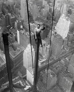 working at the top of a skyscrapper